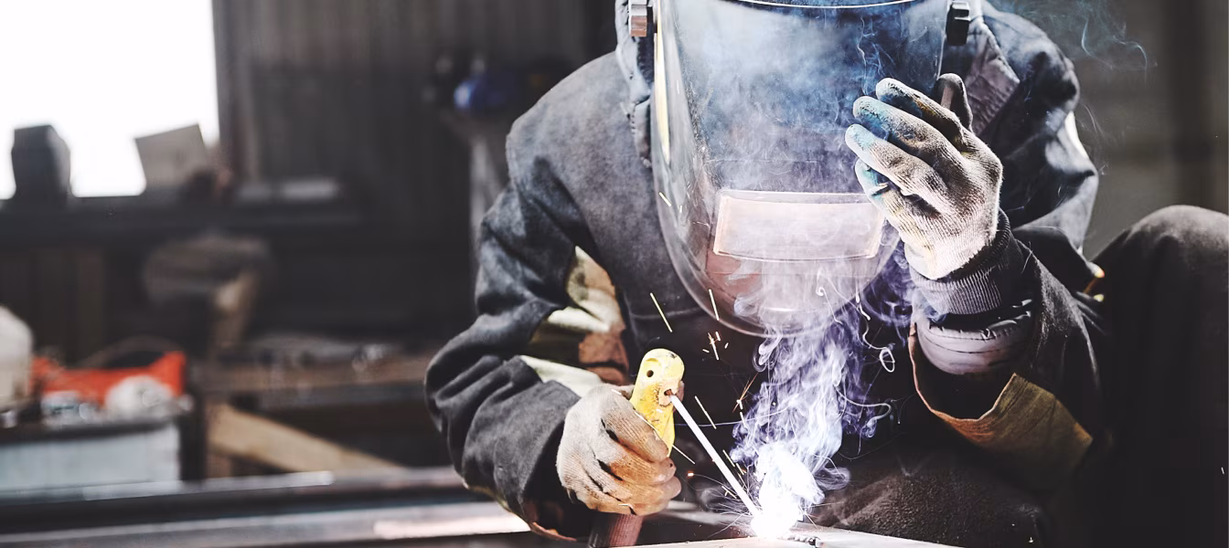 Welder With Airborne Smoke